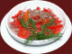 Рецепт праздничного салата из гусиной печени с помидорами и зеленью.