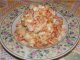 Рецепт праздничного салата. Салат из яблок и тыквы с соком красной смородины и орехами.
