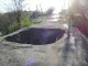 Огромная дыра на Дороге в Коксовке. Фото калитва.ру