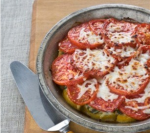 Новогодний рецепт: свинина запеченная под шубой из перцев и помидор