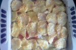 Рецепт картофеля, запеченного с куриным филе и помидорами под сыром