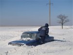 В Багаевском районе полицейские спасли семью, застрявшую на своем авто в снежном заносе