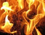 Мусор во дворе стал причиной возгорания дома в Азовском районе