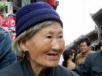 Китаянка собирается компенсировать 60  лет молчания