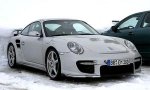 Porsche 911 GT2 2008 снимает камуфляж