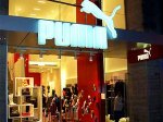 Владелец марки Gucci купит компанию Puma