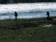 Двое у разлившейся реки Калитва.Фото Калитва.ру