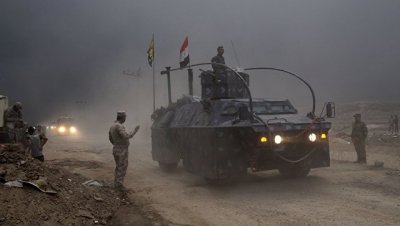 Иракская полиция готовится атаковать занятый боевиками Мосул с юга