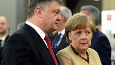 Меркель обсудила с Порошенко реализацию минских соглашений