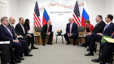 Путин и Трамп говорили о международной торговле, заявил Песков